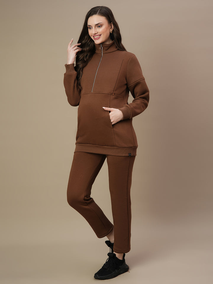 Brown winter maternity co-ord set styled with zip-up sweatshirt and ankle-length pants