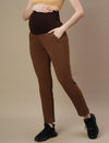side view of brown maternity winter pants with ultra-soft waistband and side pockets.