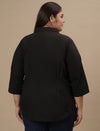 Plus-size woman in back view wearing Black Cotton Plus Size Formal Top with straight hem and smooth back