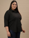 Plus-size woman in front right angle view wearing Black Cotton Plus Size Formal Top with clean lines and formal style