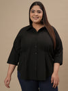 Plus-size woman in angled front view wearing Black Cotton Plus Size Formal Top with full sleeves and classic collar