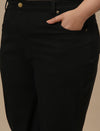Close-up view of Black Plus Size Bootcut Jeans showing high-rise waistband and stretch denim texture