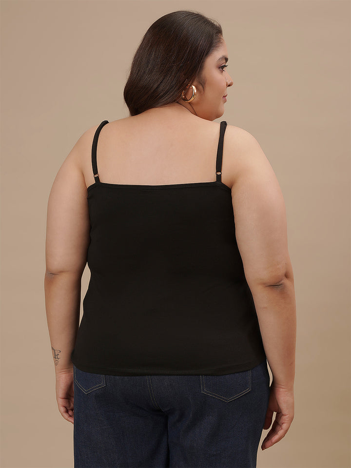 Plus-size woman in back view wearing Black Plus Size Camisole with adjustable straps and smooth back design