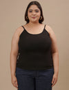 Plus-size woman in front view wearing Black Plus Size Camisole with scoop neckline and relaxed fit