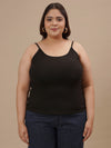 Plus-size woman in front view wearing Black Plus Size Camisole with scoop neckline and relaxed fit