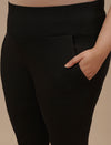 Close-up view of Black Plus Size Capri Pants showing waistband and stretch fabric detail