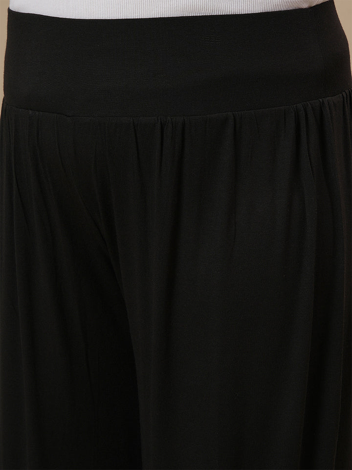 Close-up view of Black Plus Size Harem Pants showing elastic waistband and soft, breathable fabric