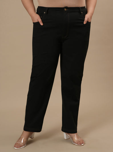 Plus-size woman in front view wearing Black Plus Size Straight Fit Jeans with mid-rise waist and straight leg design