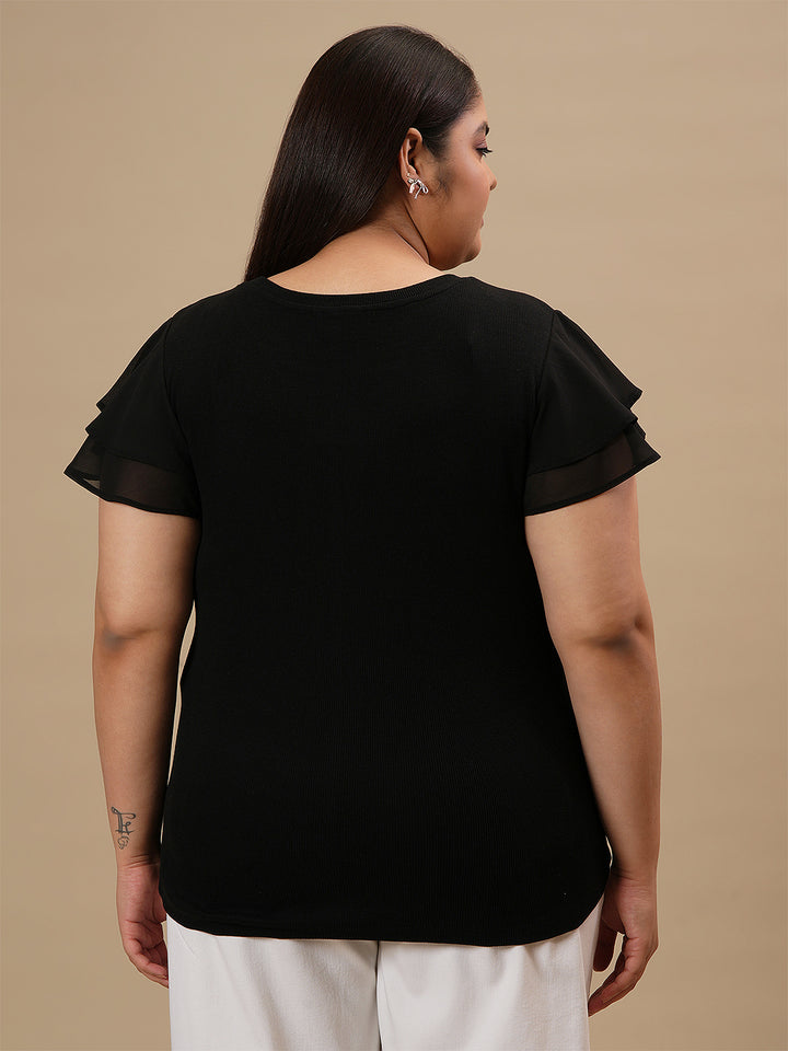 Plus-size woman in back view wearing Black Plus Size Stretchy Top with clean back and slim fit
