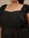 Close-up view of Black Sleeveless Plus Size Peplum Top showing fabric texture and waist detailing