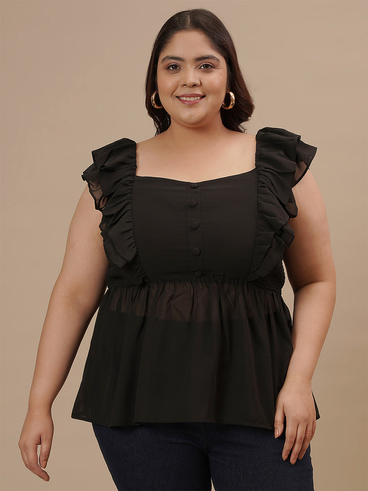 Plus-size woman in front view wearing Black Sleeveless Plus Size Peplum Top featuring peplum cut and form-fitting bodice