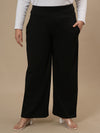 Plus-size woman in front view wearing Black Wide Leg Plus Size Pants with full-length wide leg and high-rise waist