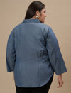 Plus-size woman in back view wearing Plus Size Blue Denim Shirt with full sleeves and relaxed fit
