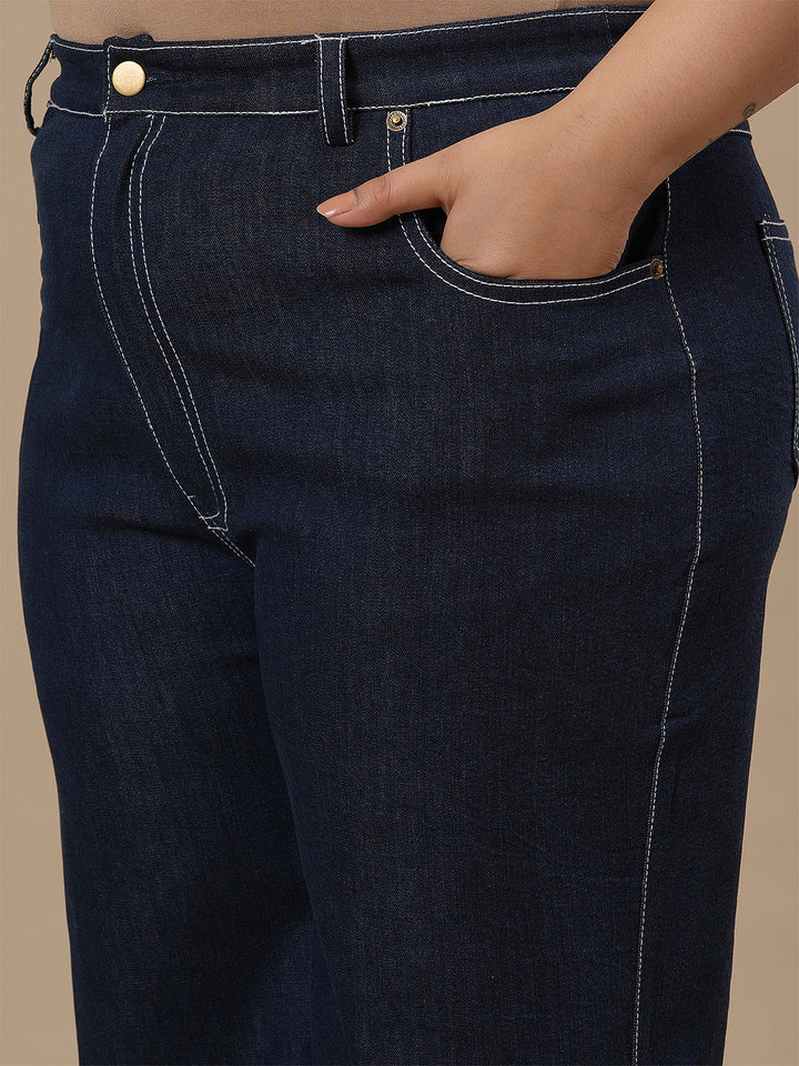 Close-up view of Blue Plus Size Bootcut Jeans showing waistband and denim texture