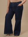 Plus-size woman in front left angle view wearing Blue Plus Size Bootcut Jeans with slim thigh and flared bottom
