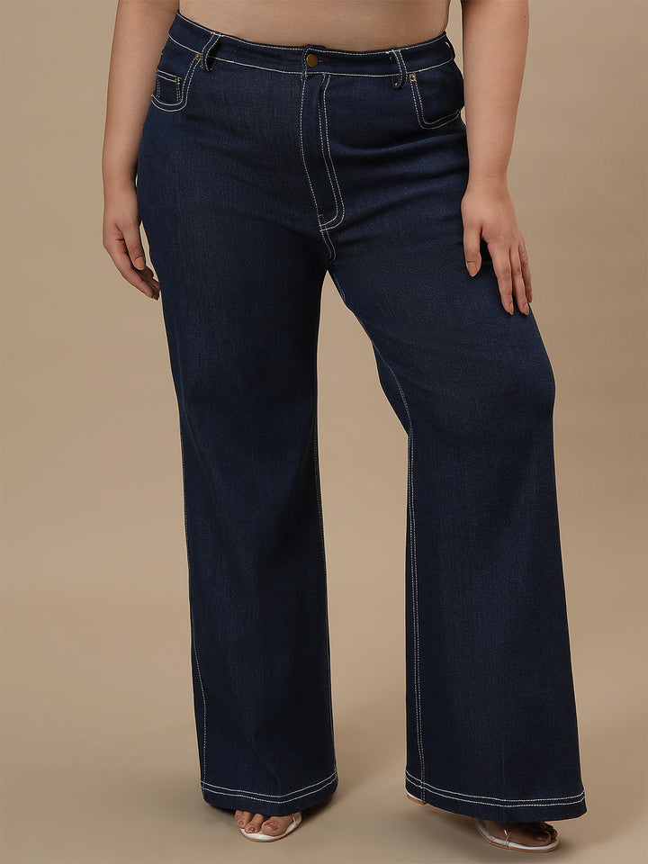 Plus-size woman in front look wearing Blue Plus Size Bootcut Jeans with fitted waist and bootcut style