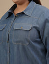 Close-up view of Blue Plus Size Denim Shirt showing button-front closure and denim texture