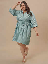 Plus-size woman in front pose wearing Blue Plus Size Satin Dress with V-neckline and elegant satin sheen