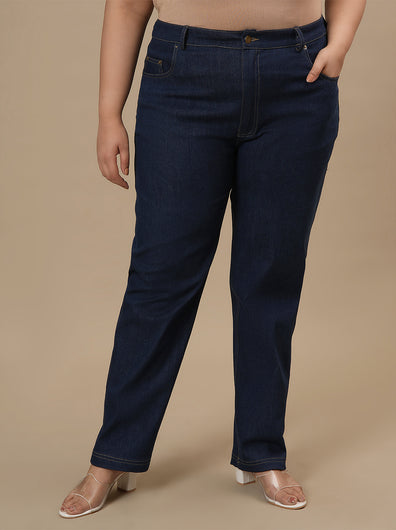 Plus-size woman in front view wearing Blue Plus Size Straight Fit Jeans with mid-rise waist and straight leg design