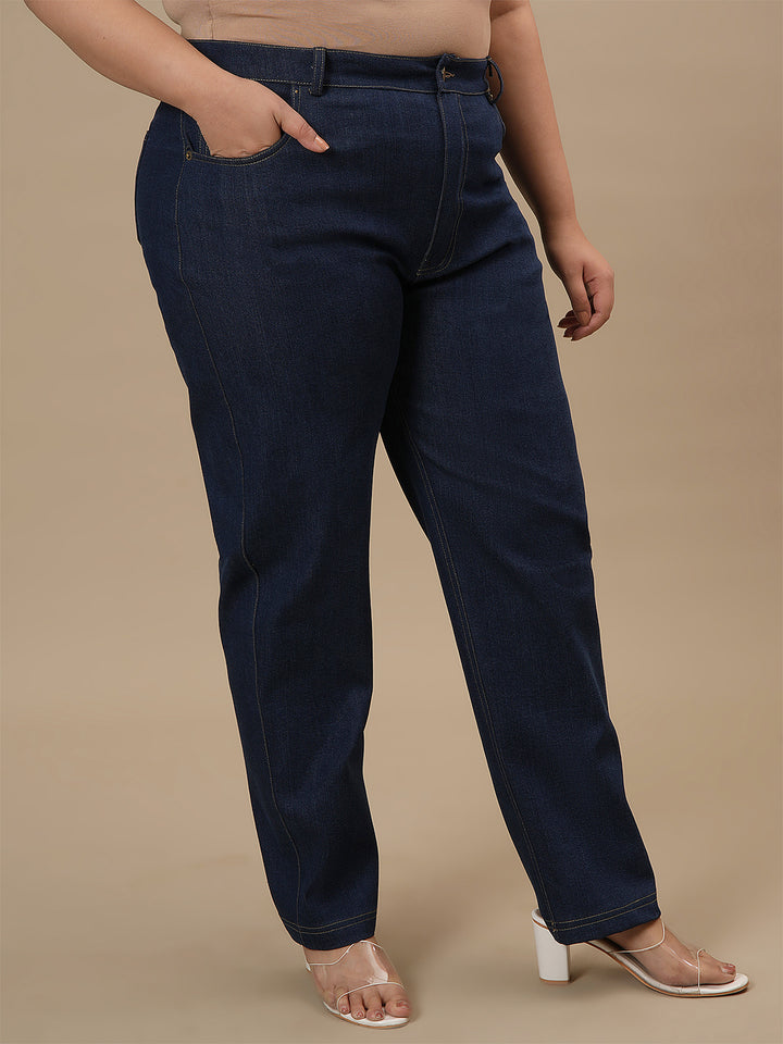 Plus-size woman in side view wearing Blue Plus Size Straight Fit Jeans with mid-rise waist and straight leg design