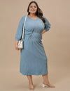 Plus-size woman in style shoot wearing Blue Plus Size Striped Sheath Dress with fitted shape and stripe pattern
