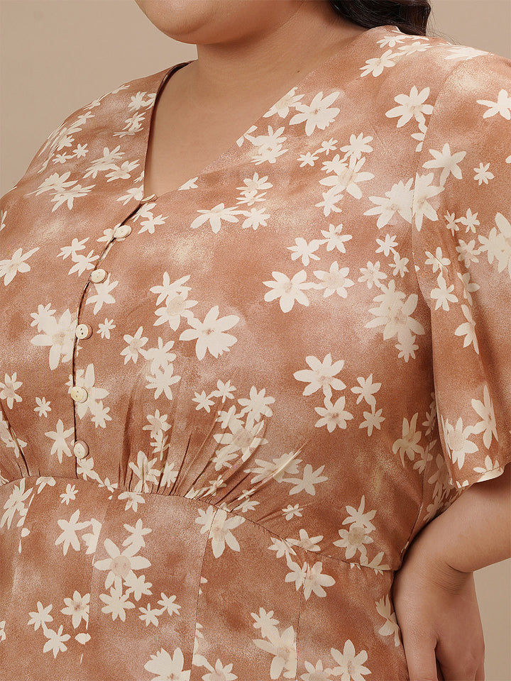 Close-up view of the bust area on the Casual Plus Size Floral Print Dress showing neckline, buttons, and floral print.