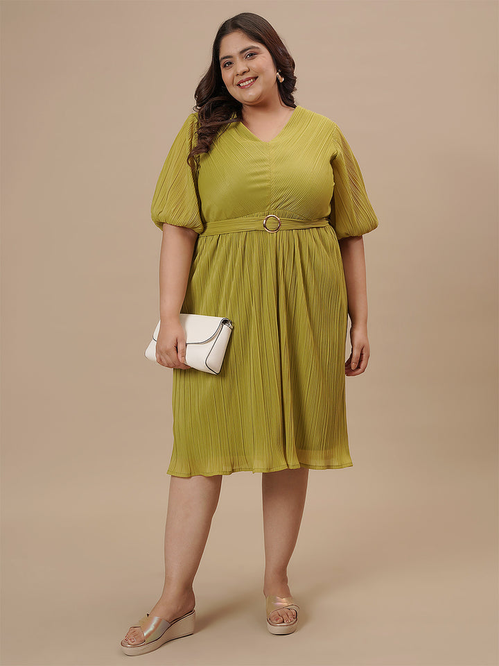 Plus-size woman in front view holding a bag while wearing Green Pleated Plus Size Formal Dress with pleated detail