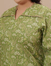 Close-up view of Green Plus Size Floral Top showing floral print and soft fabric texture