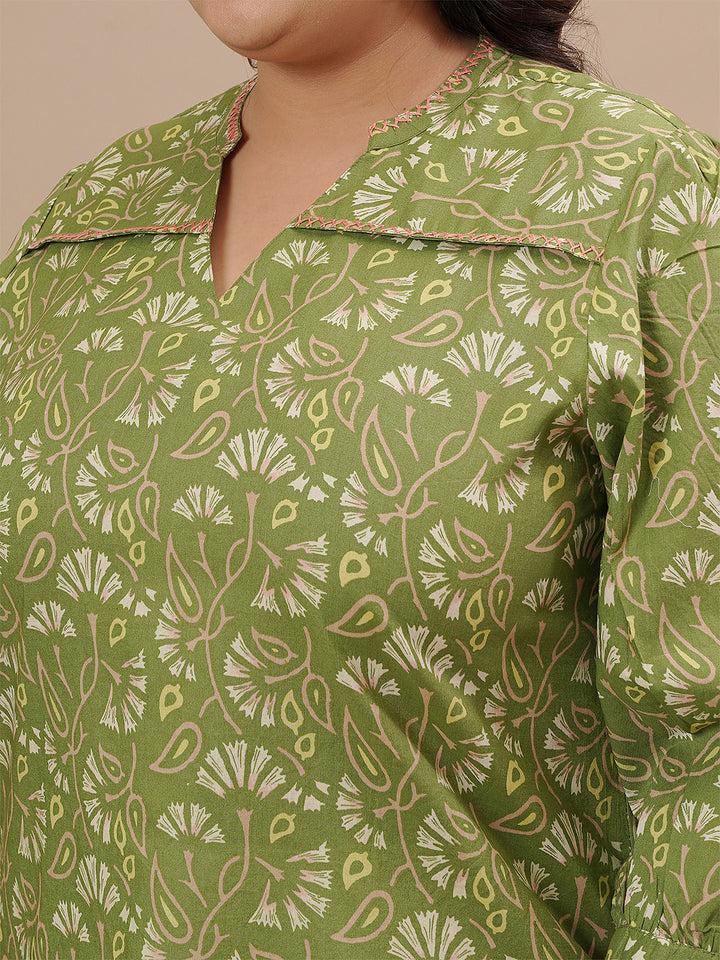 Close-up view of Green Plus Size Floral Top showing floral print and soft fabric texture