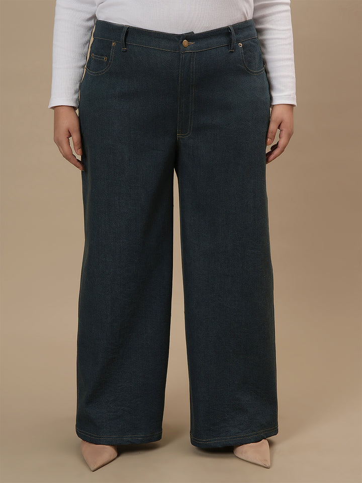 Plus-size woman in front view wearing Green Plus Size Wide Leg Jeans featuring high-rise fit and wide-leg design