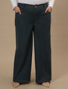 Plus-size woman in front pose wearing Green Plus Size Wide Leg Jeans with roomy leg cut and tailored waist