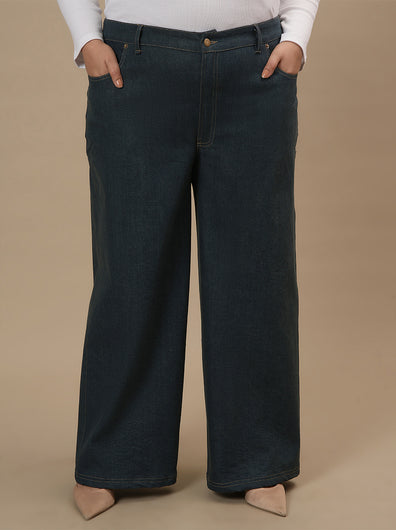 Plus-size woman in front pose wearing Green Plus Size Wide Leg Jeans with roomy leg cut and tailored waist