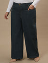 Plus-size woman in left side view wearing Green Plus Size Wide Leg Jeans with high-rise waist and wide-leg silhouette