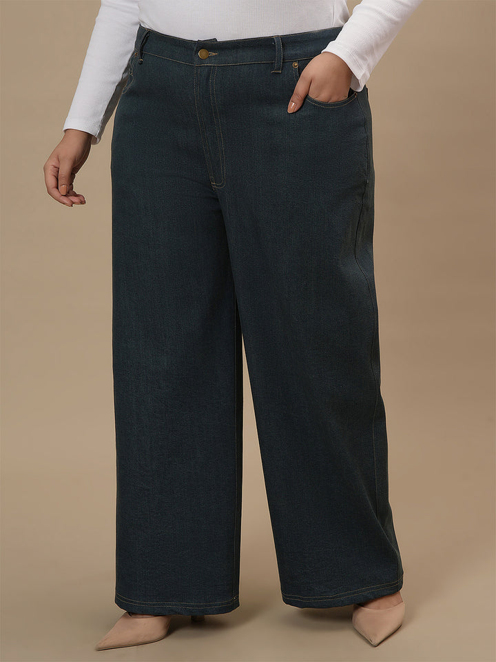 Plus-size woman in left side view wearing Green Plus Size Wide Leg Jeans with high-rise waist and wide-leg silhouette