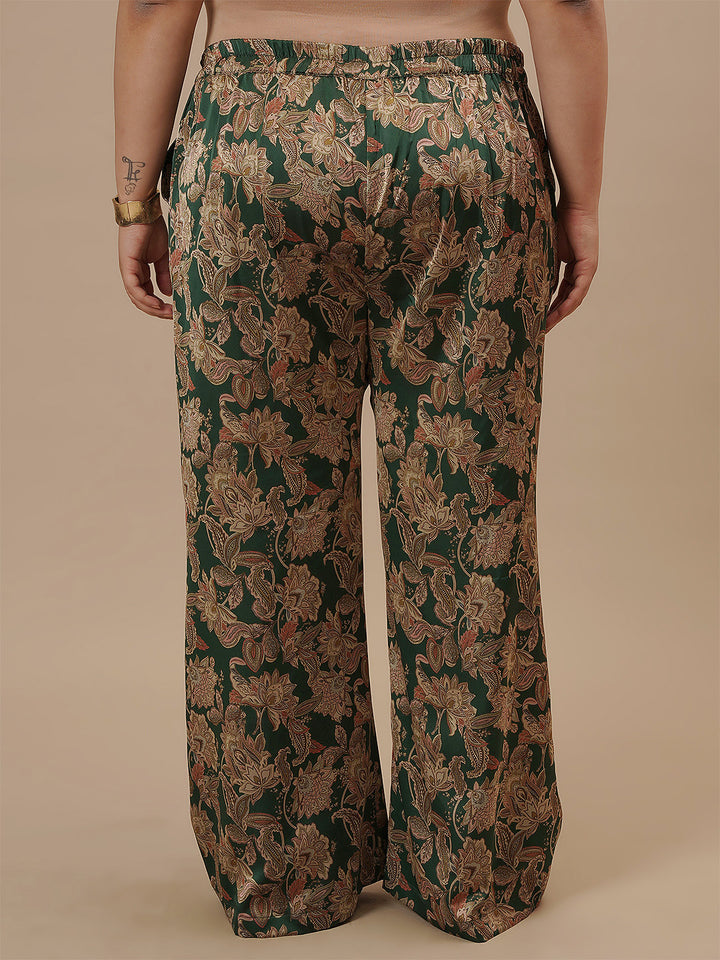 Plus-size woman in back view wearing Green Satin Plus Size Co-Ord Set with shiny satin texture and comfortable fit