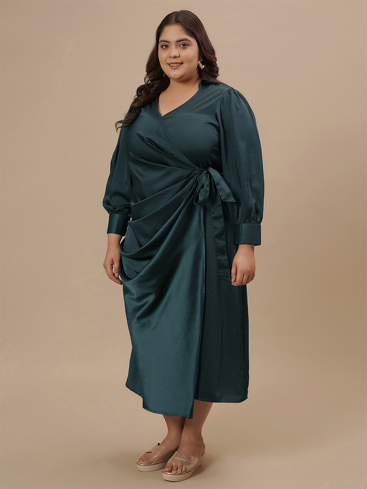 Plus-size woman standing straight wearing Green Satin Plus Size Wrap Dress with long sleeves and flowing hem