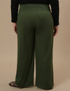 Plus-size woman in back view wearing Green Wide Leg Plus Size Pants with clean back and wide-leg silhouette