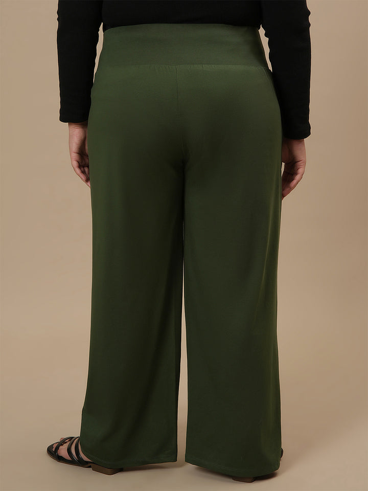 Plus-size woman in back view wearing Green Wide Leg Plus Size Pants with clean back and wide-leg silhouette