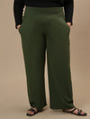 Plus-size woman in front view wearing Green Wide Leg Plus Size Pants featuring relaxed fit and full-length silhouette