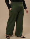Plus-size woman in side angle view wearing Green Wide Leg Plus Size Pants with high-rise waist and soft drape