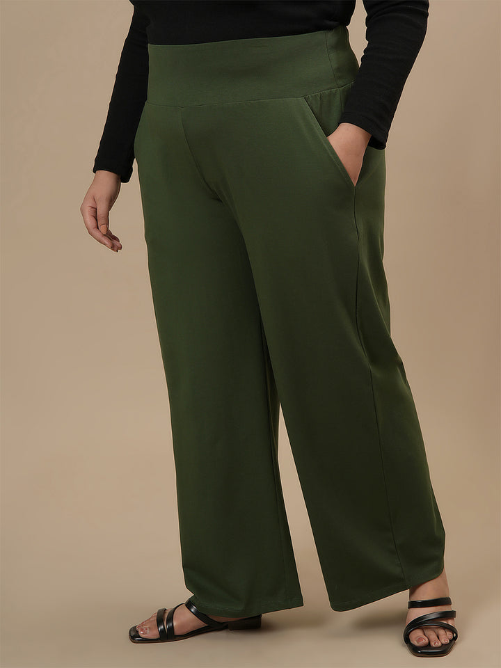 Plus-size woman in left side view wearing Green Wide Leg Plus Size Pants with comfortable fit and wide-leg design