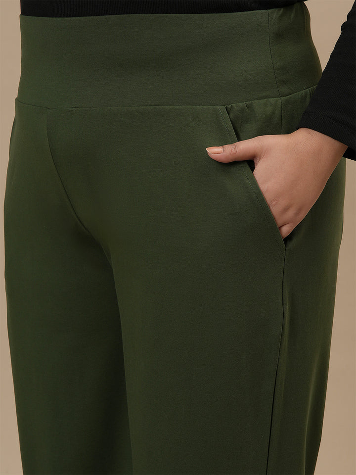 Close-up view of Green Wide Leg Plus Size Pants showing elastic waistband and soft fabric texture