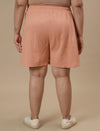Plus-size woman in back view wearing High-Waisted Plus Size Cotton Shorts featuring high-rise waist and casual cut