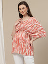 side of pregnant woman wearing Tie-Dye Kaftan Maternity Top