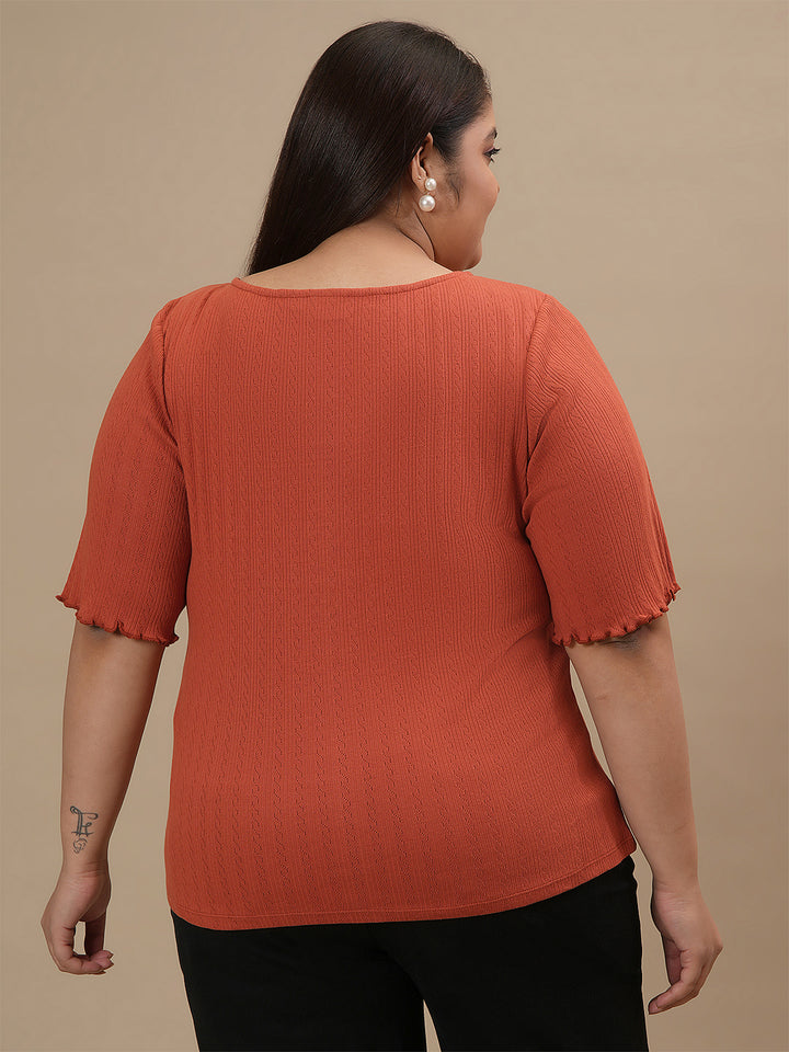 Plus-size woman in back view wearing Orange Plus Size V Neck Top with straight hem and relaxed fit