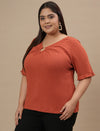 Plus-size woman in front left angle view wearing Orange Plus Size V Neck Top with soft fabric and casual cut