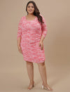 Plus-size woman in front look wearing Pink Plus Size Bodycon Dress with body-hugging shape and sleeveless style