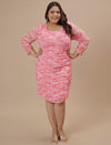 Plus-size woman in styled front pose wearing Pink Plus Size Bodycon Dress with flattering, curve-hugging fit