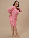 Plus-size woman in right side view wearing Pink Plus Size Bodycon Dress with sleeveless cut and contoured fit