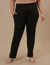 Plus-size woman in front view wearing Plus Size Black Casual Pants with drawstring waist and casual fit